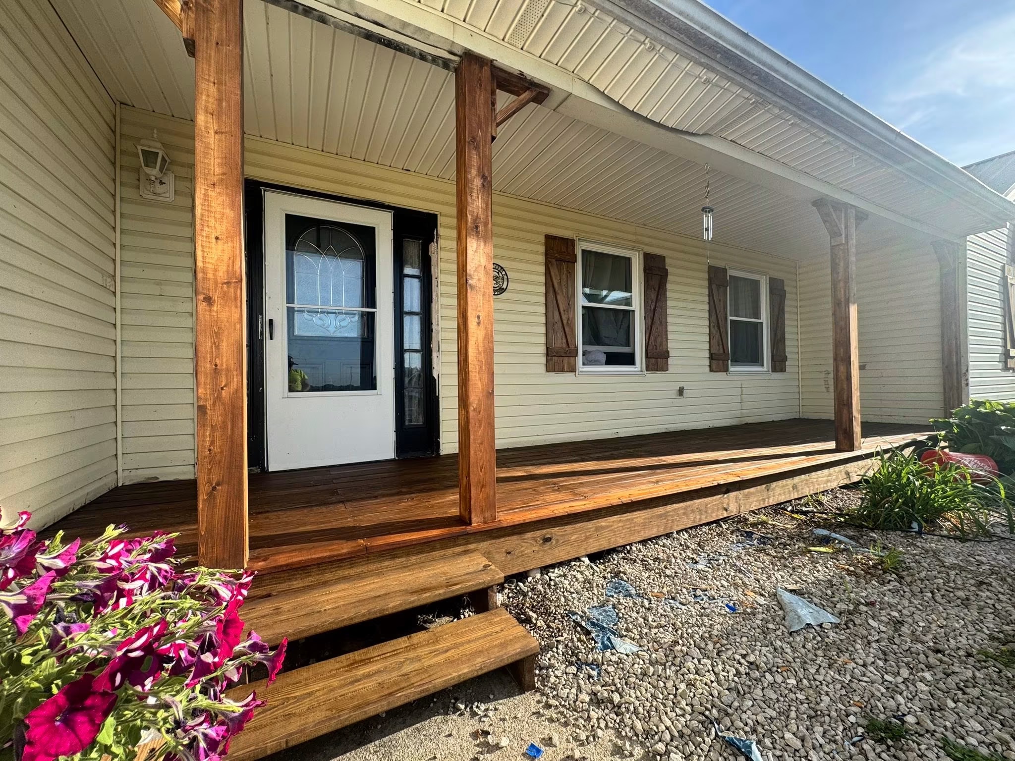 Completed Catalyst Contractors covered porch and exterior carpentry project